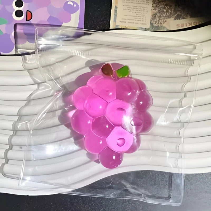 Purple squishy jelly grape fidget toy